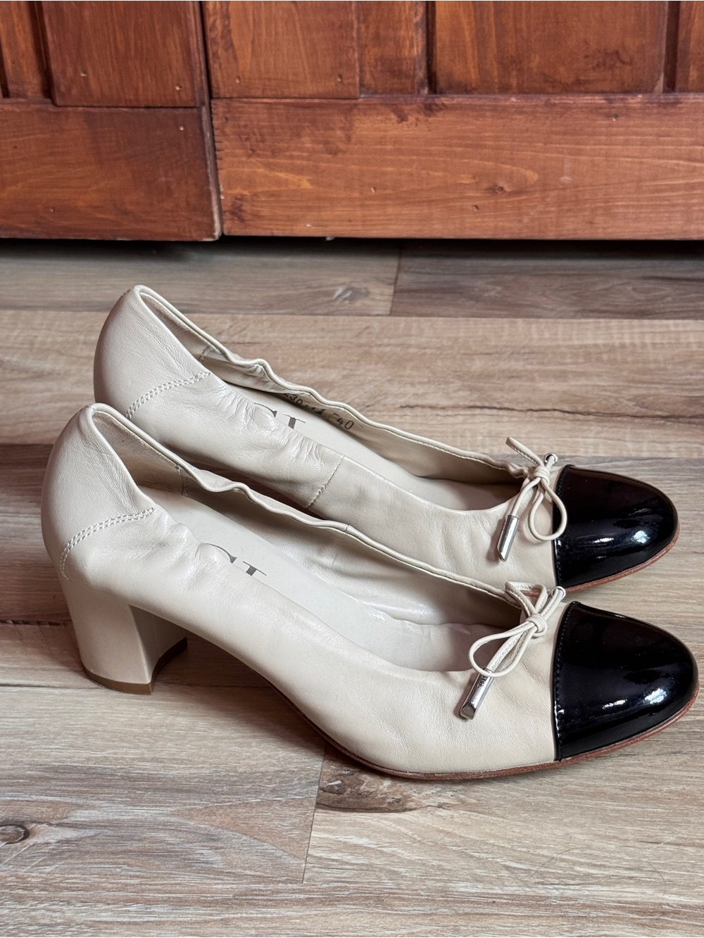 AGL Cream Leather Pumps with Black Patent Cap Toe